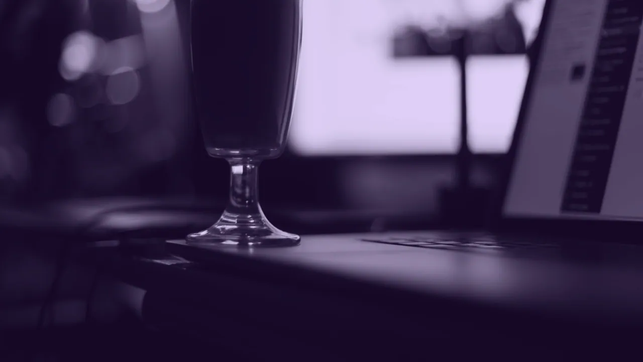 A screen photographed out of focus, so nothing on it resolves.